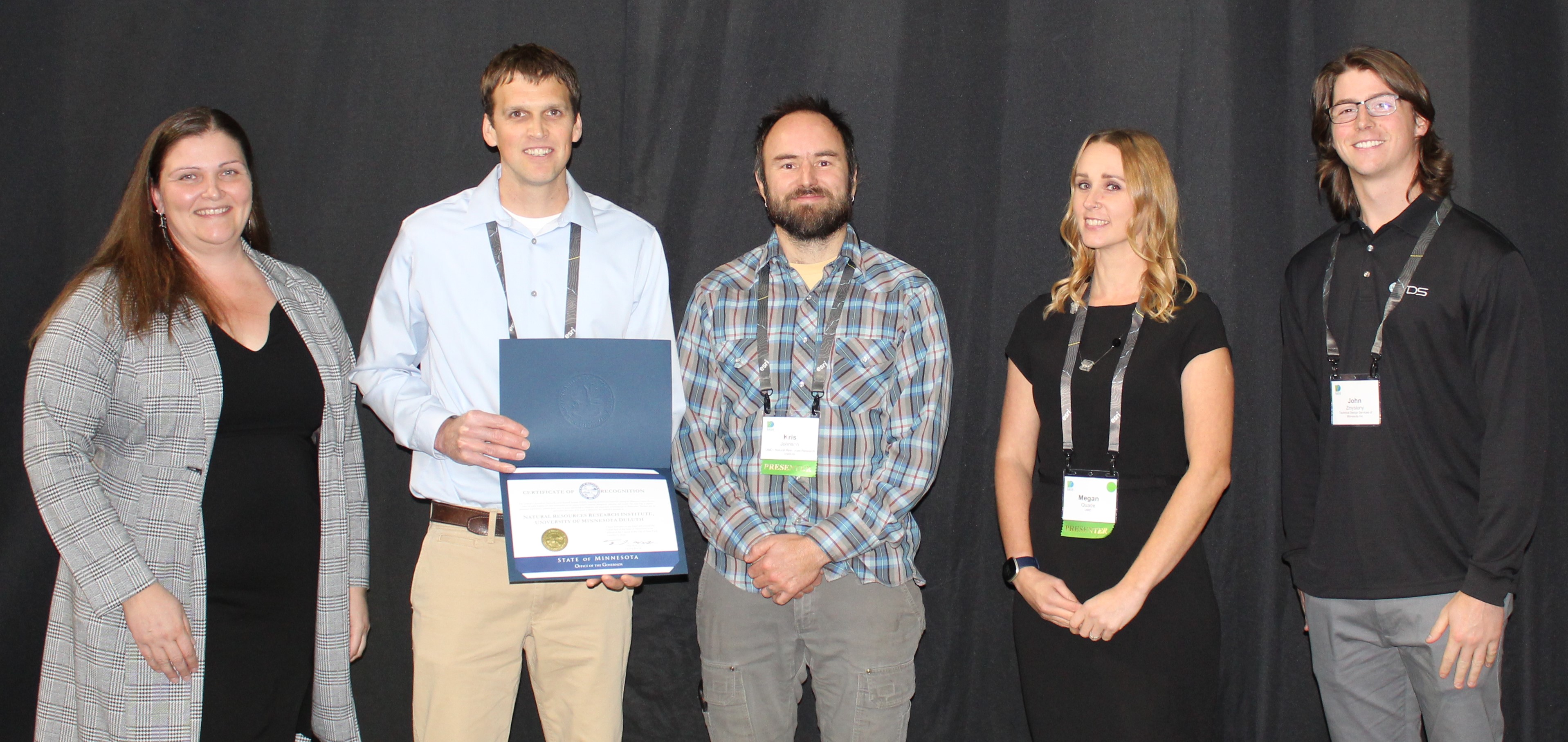 Minnesota Natural Resource Atlas team representatives accepted the award